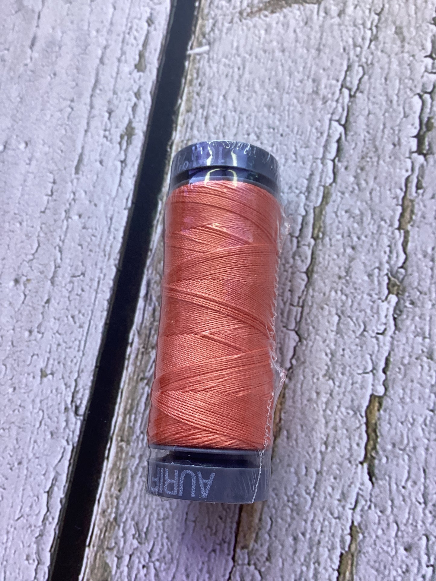 Aurifil thread 28 wt - pale orange 2220