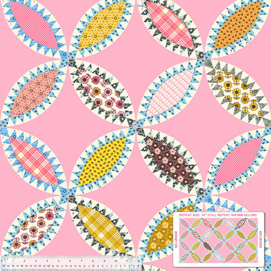 pastel pink fabric with patchwork quilting colourful pieces in a flower pattern